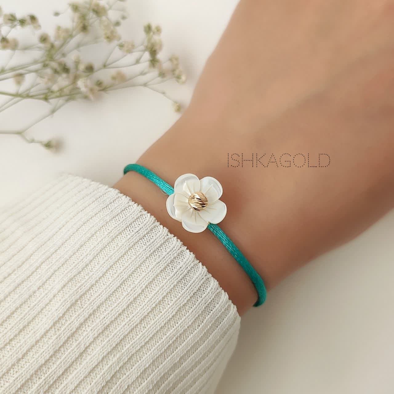 دستبند گوی طلا دستبند گوی طلا و صدف گل