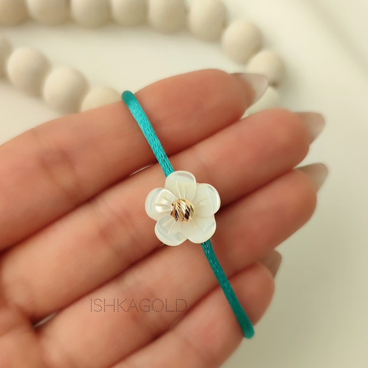 دستبند گوی طلا دستبند گوی طلا و صدف گل